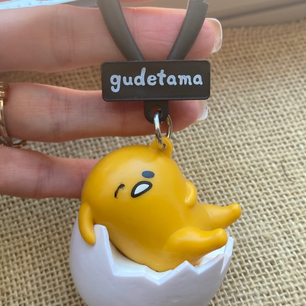 Gudetama keychain in good condition  egg man